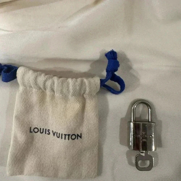 LV Silver Lock and Key in Dust Bag - Picture 2 of 5